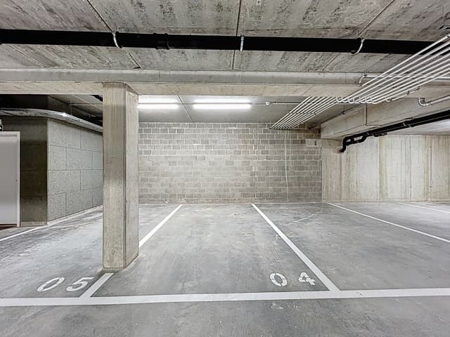 LASNE CENTRE - Emplacement de parking intérieur sécurisé